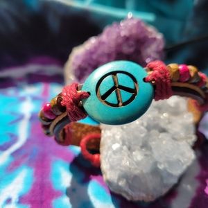 Handmade adjustable, festival peace bracelet, leather with wood & stone beads.